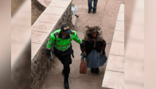 Un policía tiene un hermoso gesto con una señora durante las elecciones [FOTOS]