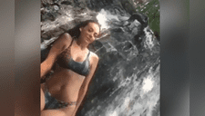 Chica posa sexy frente a una cascada, extraño ser aparece y lo arruina todo [VIDEO] 