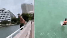 Joven arriesga su vida y salta de un puente para salvar a perro que se ahogaba (VIDEO)