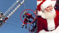 Papá Noel reparte dulces por navidad y queda atrapado en cables de luz (VIDEO)