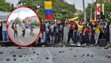 Colombia: madre retira a su hijo de a "correazos" de una protesta (VIDEO)