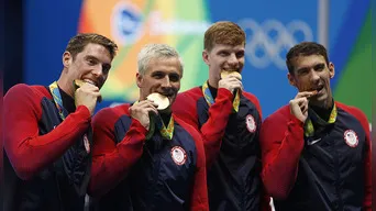 La verdadera razón de por qué los deportistas muerden sus medallas