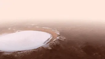 Difunden impactantes imágenes de un cráter con nieve en el planeta Marte (VIDEO)
