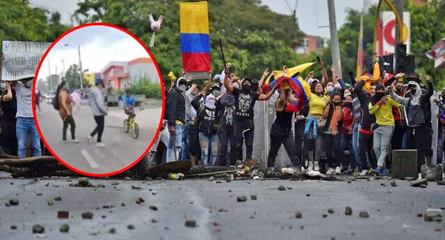 Madre retira a su hijo de protestas en Colombia a 'correazos'.